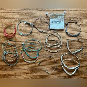 Bag of 18 Pura Vida Bracelets. Desert, mountains, compass, pine tree, neutrals